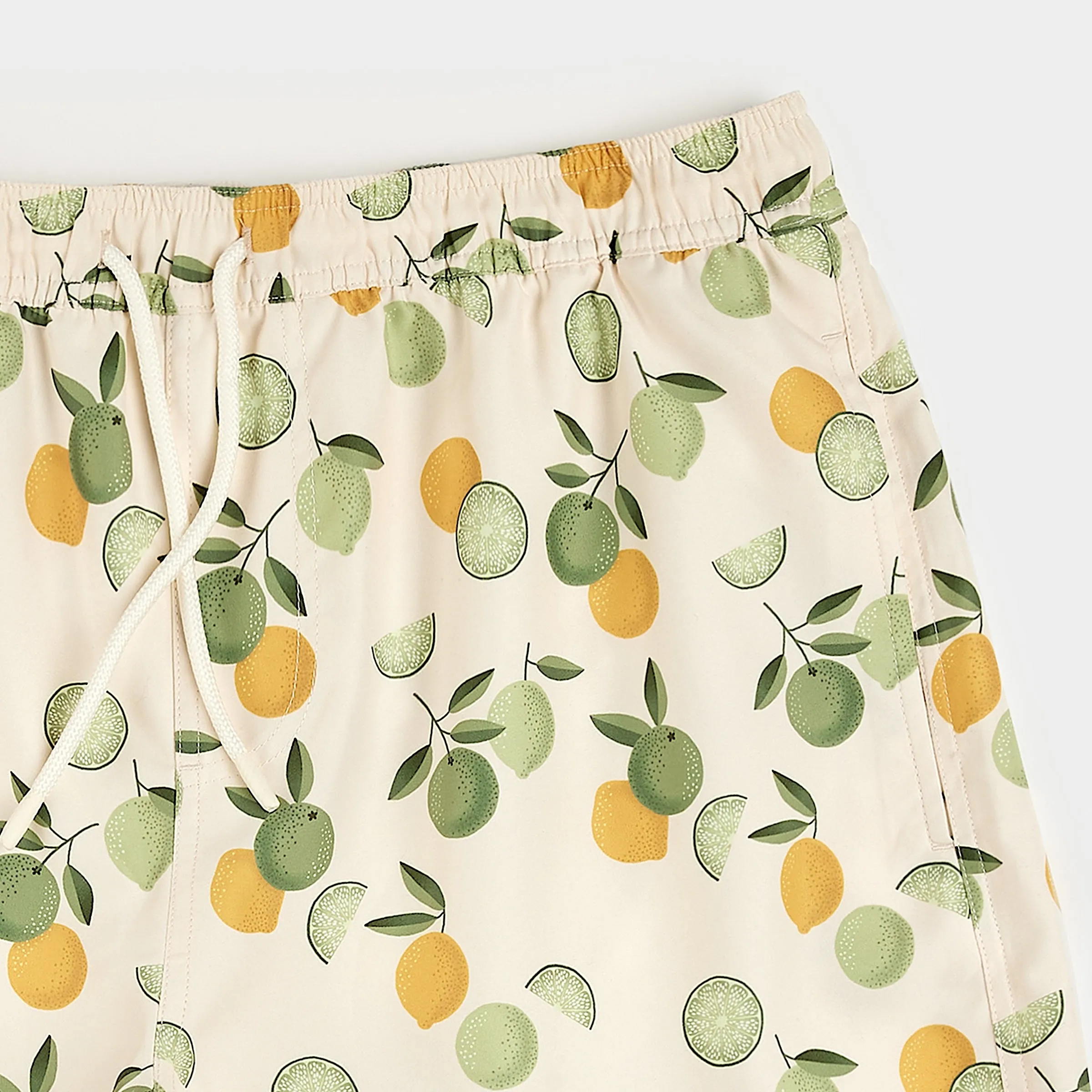 Citrus Print on Antique White Men's Swim Trunks